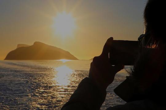 Photographing the midnight sun outside of Tromsø